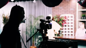 silhouete man operating camera